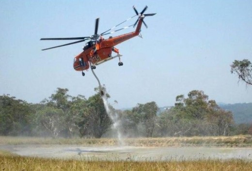 Air crane picks up another load of water