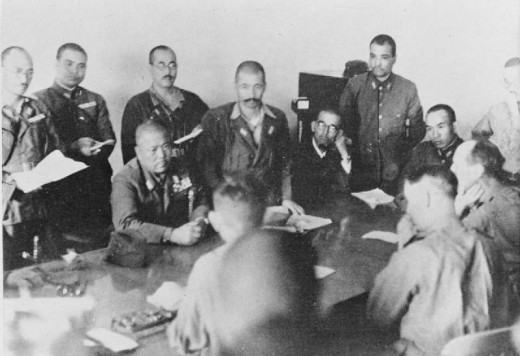 Negotiations for the British surrender, with Lieutenant-General Tomoyuki Yamashita (centre, seated) thumping the table demanding for unconditional surrender