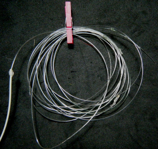 A hand tied leader tied on a 6wt forward floating fly line.  Most of the knots are on the right side of the roll.