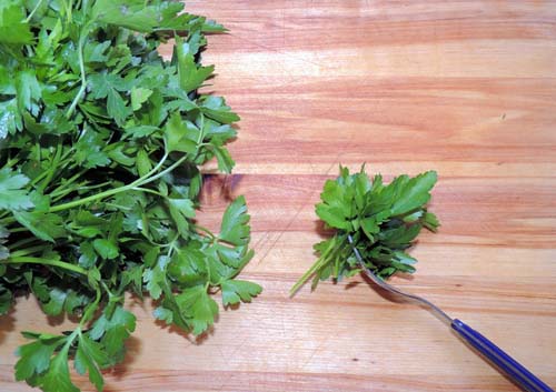 remove parsley leaves easily by running a fork through them