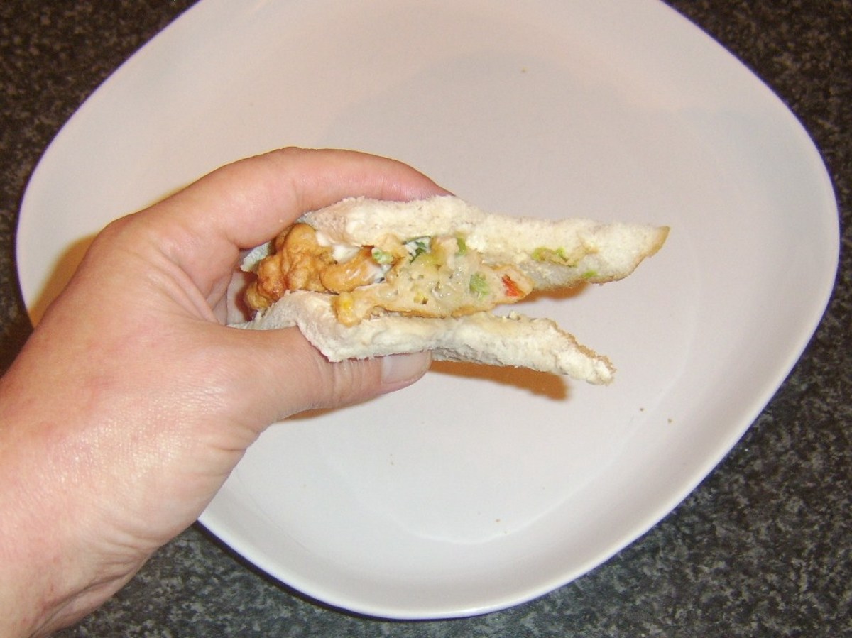 Tucking in to a bell pepper fritter sandwich