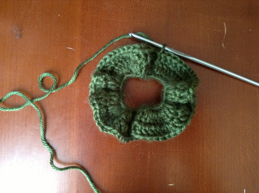 Crochet a round of double crochet.