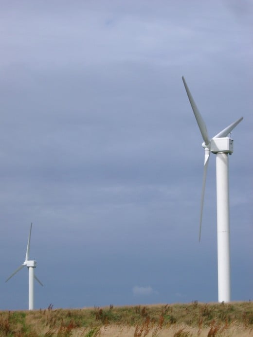 The modern way to use the wind to produce renewable energy - wind turbines.