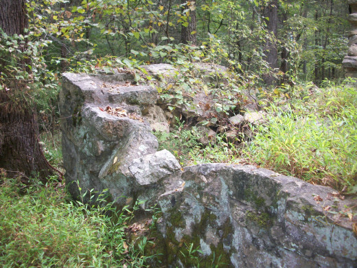 Remains of the original 1790s Robinson Rockhouse, a historic site located within Reedy Creek Nature Preserve