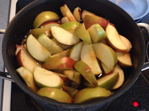 Boil cored apples. 