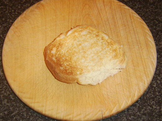 Bread roll base is lightly toasted