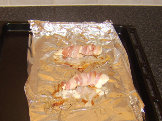 Chicken and bacon parcels are cooked