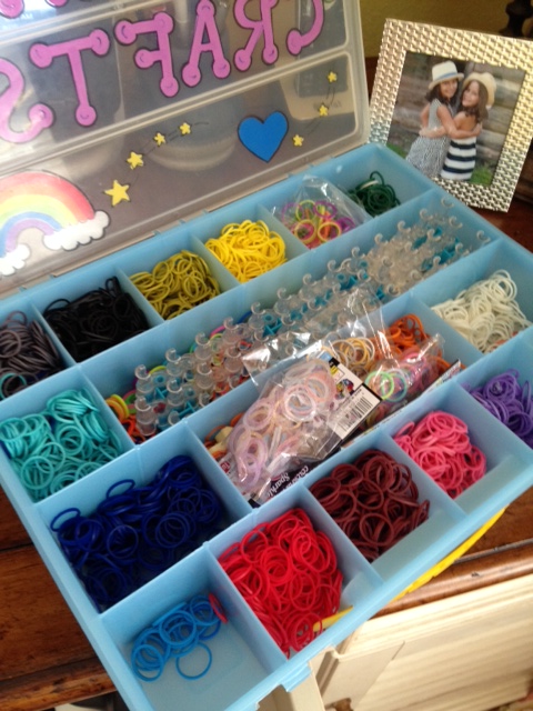Rainbow Loom and rubber band storage case.