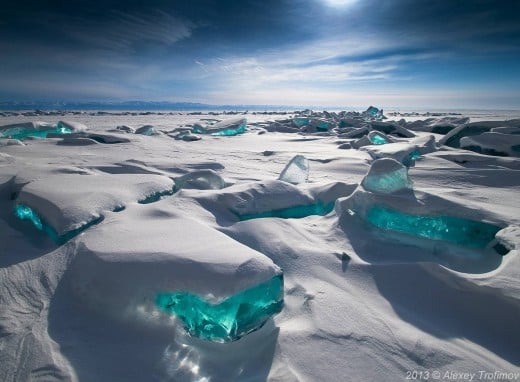 Amazing turquoise solid ice on northern part of lake Baikal during winter season Amazing turquoise solid ice on northern part of lake Baikal during winter season