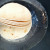 6 flour tortillas generously greased and stacked neatly. 6 flour tortillas generously greased and stacked neatly.
