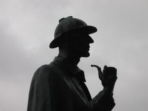 Mr. Sherlock Holmes. The figure stands watch at Baker Street tube station in London. First appearing in the laste 1880s, he is more famous than Star Trek in the 2010s.