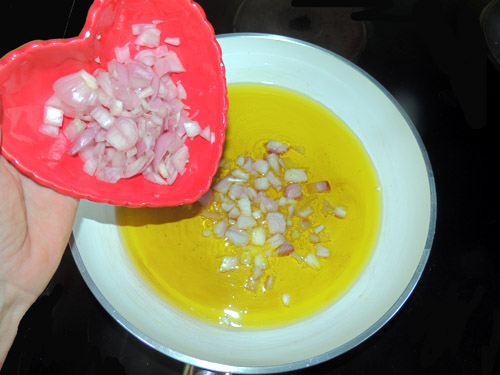 Head over to stovetop. To sizzling oil over med high heat, add shallots first--