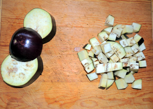 Meantime, prep your eggplant. It browns quickly so that is why this step is left until the last minute. Cut into ½ inch chunks, peel on.