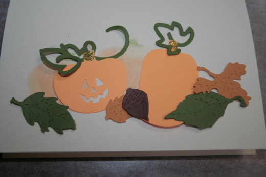 Pumpkins, leaves, and vine die cut shapes.