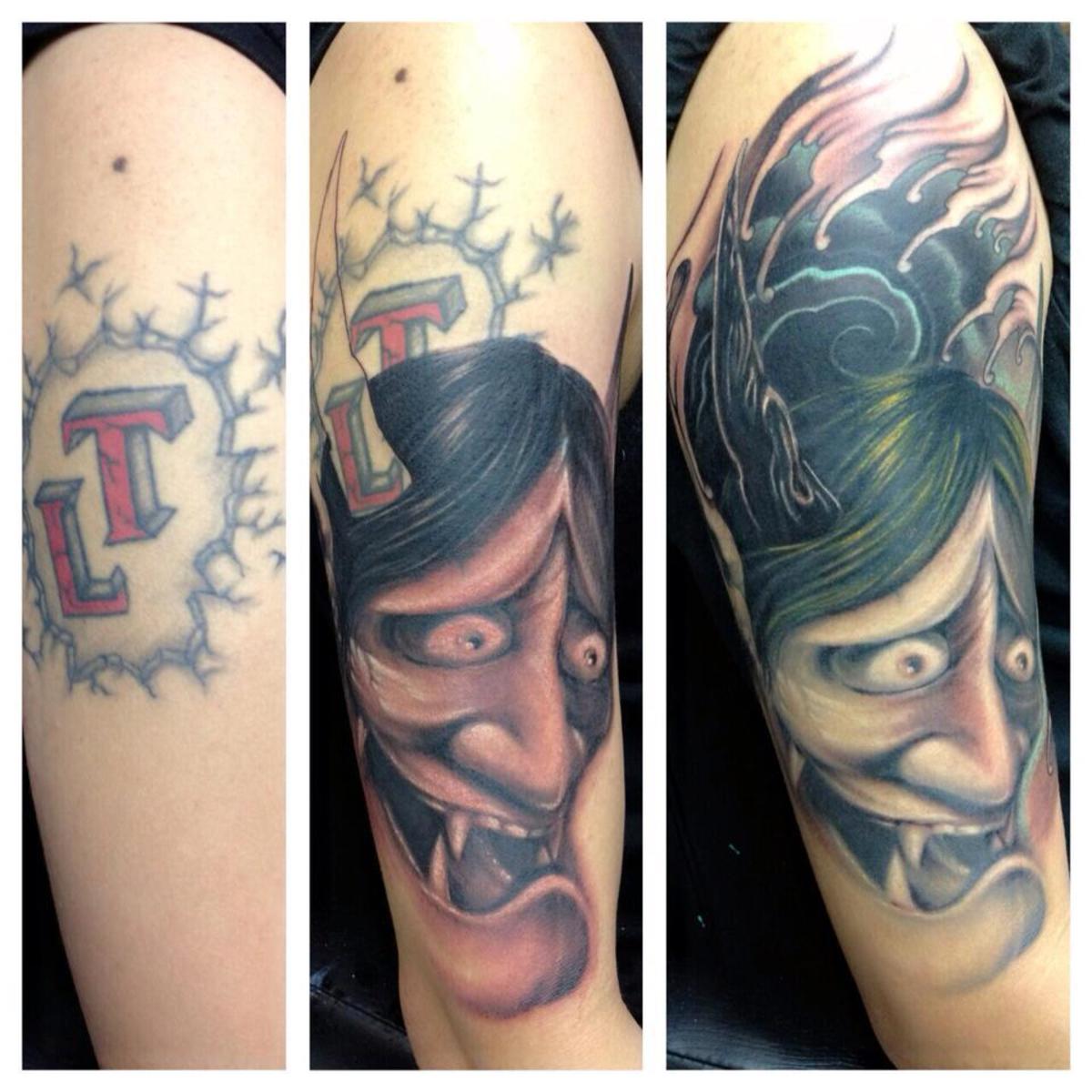 The use of the colour black has worked well with this tattoo, and the face draws the eye away from the cover-up itself.