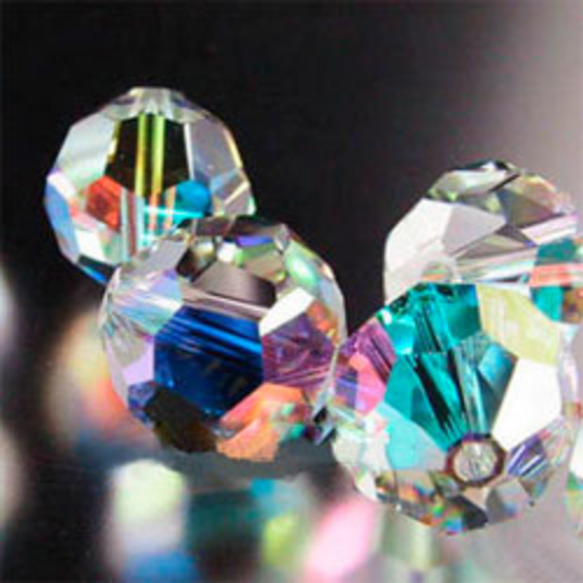 An example of AB coating on Swarovski crystal. This coating makes the crystal reflect rainbows in sunlight and is often used in jewelry and suncatchers.
