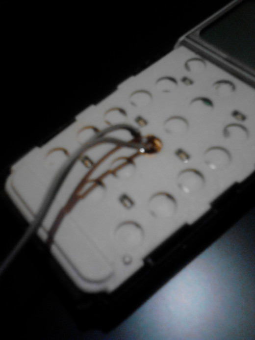 Again you need to be careful now - just use your solder device and the two wires and sticks them for half a second.