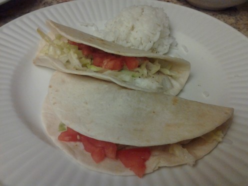 My 10 year old loves fish but not green onions, cilantro, or avocado.  I fill his tacos with tomatoes and lettuce and give him a half cup of rice to finish off his meal.