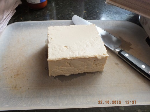 I like to slice the tofu close to a 1/2 inch thickness.  A nice thick slab.
