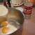 7. Measure out 1/4 cup of corn syrup and pour it into the pan using a spatula to get it all out. 7. Measure out 1/4 cup of corn syrup and pour it into the pan using a spatula to get it all out.