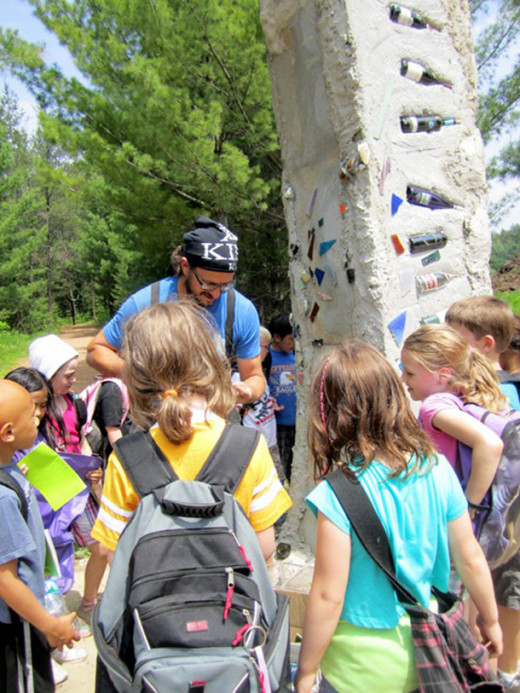 Here you can see Artist Ben Zoltak working with some local school children on his sculpture Swift Nesting Wing