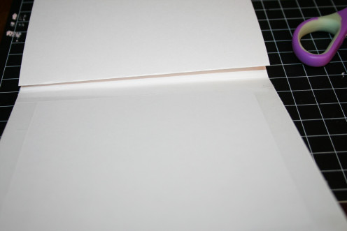 Trim the edges of the Scor-Tape with scissors.