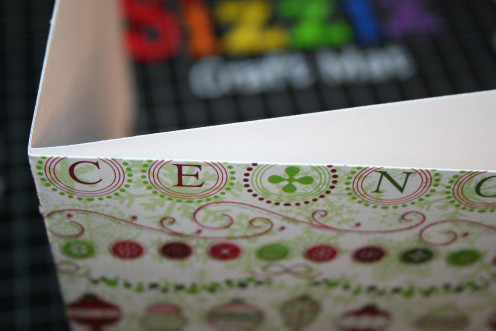 Adhere the drawing paper to the cardstock.  The Scor-Tape makes a permanent seal between the two.