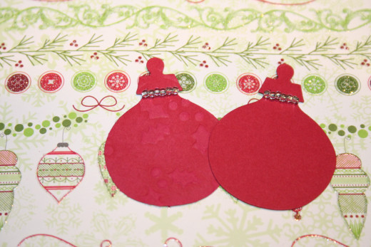 Embellishments decorated with embossing and beads.