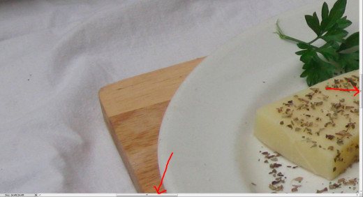 3. Use the scrollbars on the bottom and right to move the picture until you see the edge of the food you want to cut out.