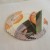 Tape a strip of cardboard to make a stand for the photo frame. Tape a strip of cardboard to make a stand for the photo frame.