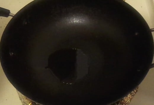Pour oil in the pan