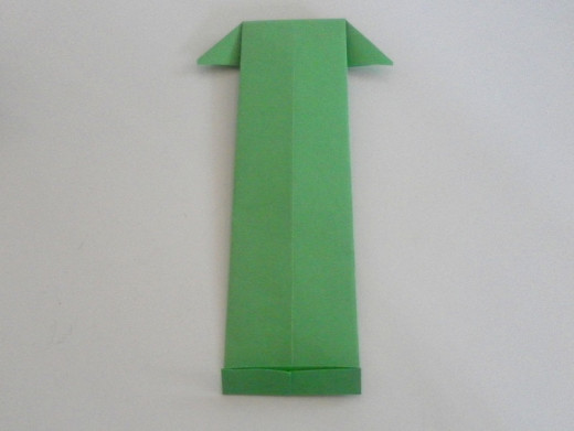 Make a small fold at the bottom of the paper.