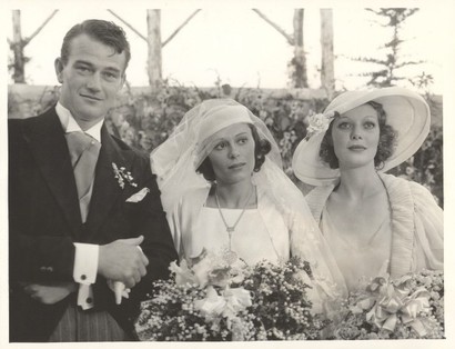 John Wayne married Josephine Saenz, daughter of the Panamanian Consul in Los Angeles on June 23, 1933.  After the ceremony, the couple and guests celebrated at the home of Loretta Young (right). Wayne divorced Josephine in 1945.