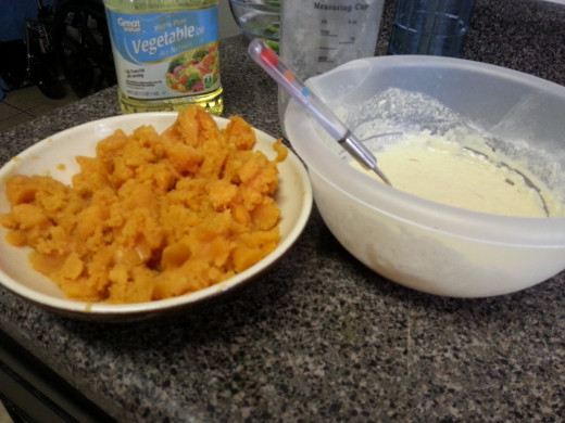 Mashing the sweet potato.