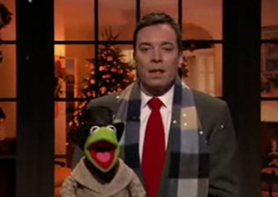 Pictured: Kermit the Frog with puppet wrangler.