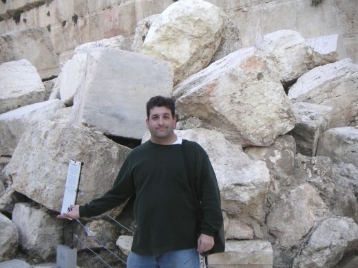 Ross stands by the temple ruins in the Old City, Israel.