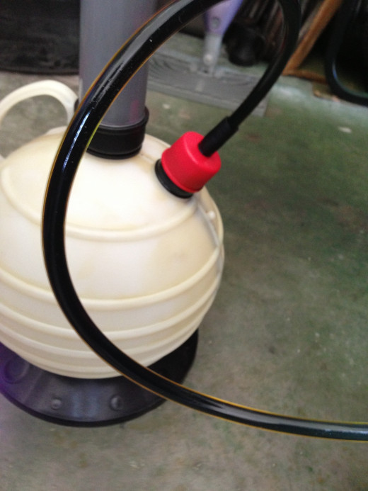 Oil turns dark when used. If its flowing freely through the hose, the color shouldn't concern you – oil can look like this after 500-to-1,000-miles.