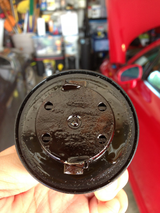 No white, milky-buildup of doom here (a sign of coolant and oil mixing in the engine). Keep knocking wood and rubbing rabbit's feet. 