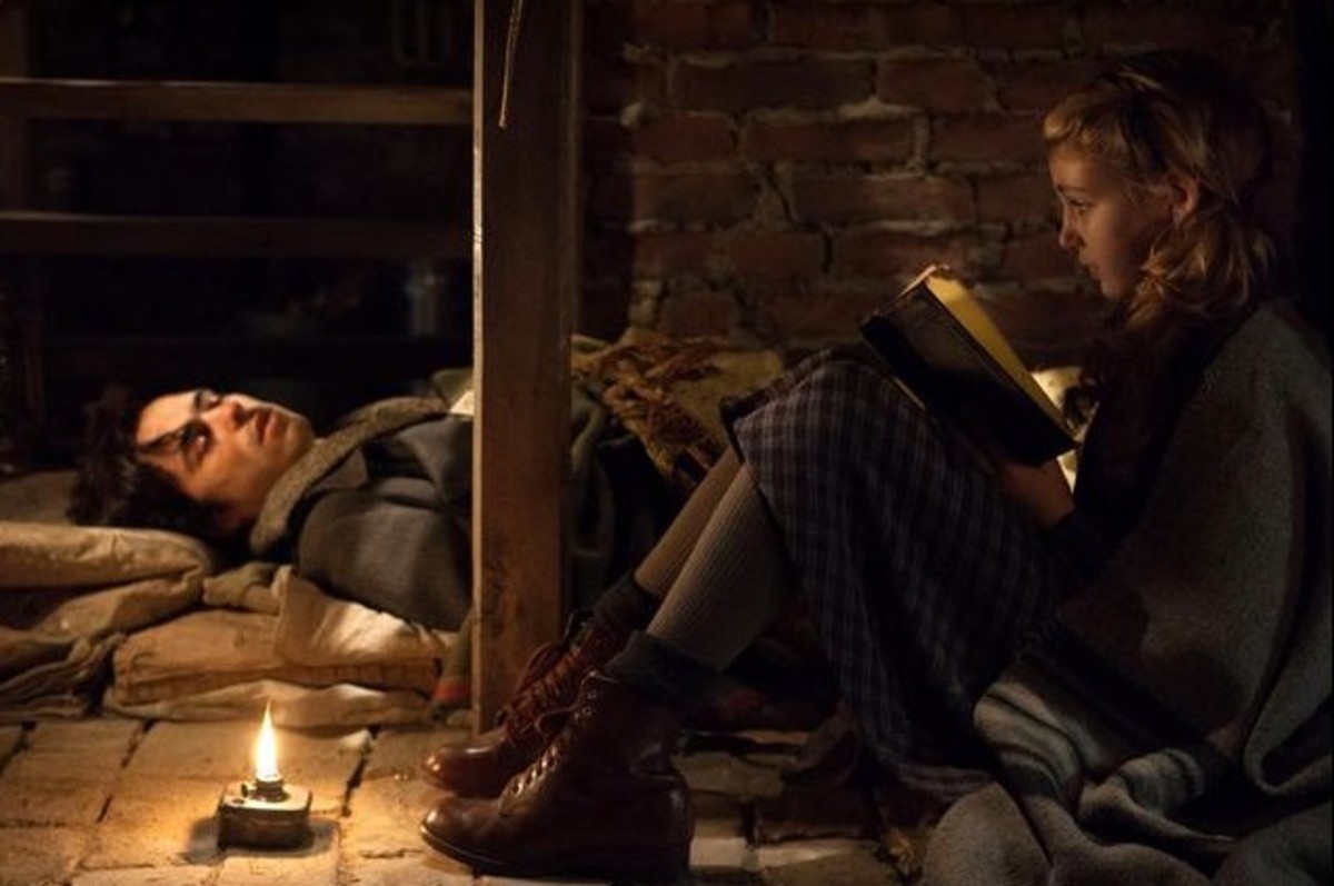 Liesel reads to Max in the basement.