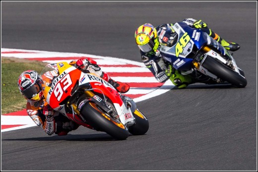 MotoGP: Marc Marquez  no. 93 leading Valentino Rossi no. 46 in practice session at Silverstone, 2013.