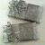Silver printed tissue paper under a sleeve of silver foil paper that says "Merry Christmas" will greet friends quite nicely. Silver printed tissue paper under a sleeve of silver foil paper that says "Merry Christmas" will greet friends quite nicely.