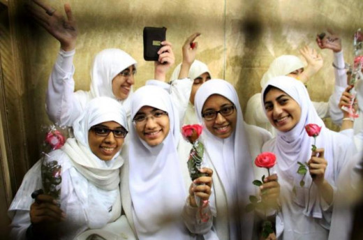 Human rights campaigners in Egypt have condemned the sentencing of a group of women and girls to 11 years in prison for protesting about the coup against President Mohammed Morsi