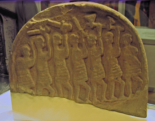 9th Century Lindisfarne grave marker, known as the Viking gravestone - shows a file of armed warriors on the march