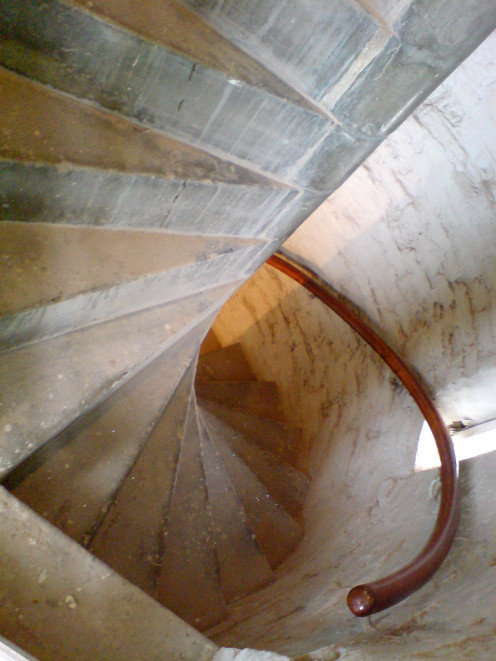 A narrow spiral staircase may be a beautiful feature of your new home. Have you considered how you will get furniture upstairs?