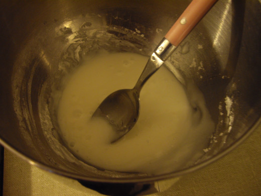 Mix in the milk and extract