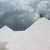 Huge mountains of salt wait transportation in a Mexican salt operation