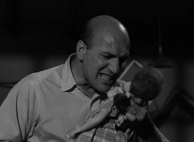 Telly Savalas as Erich Streator