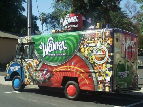 Colorful trucks carrying sweets for us.