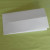 Fold the paper in half from left to right to make a vertical crease line. Fold the paper in half from left to right to make a vertical crease line.