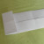 Fold the left edge to align with the first vertical line on the left. Fold the left edge to align with the first vertical line on the left.